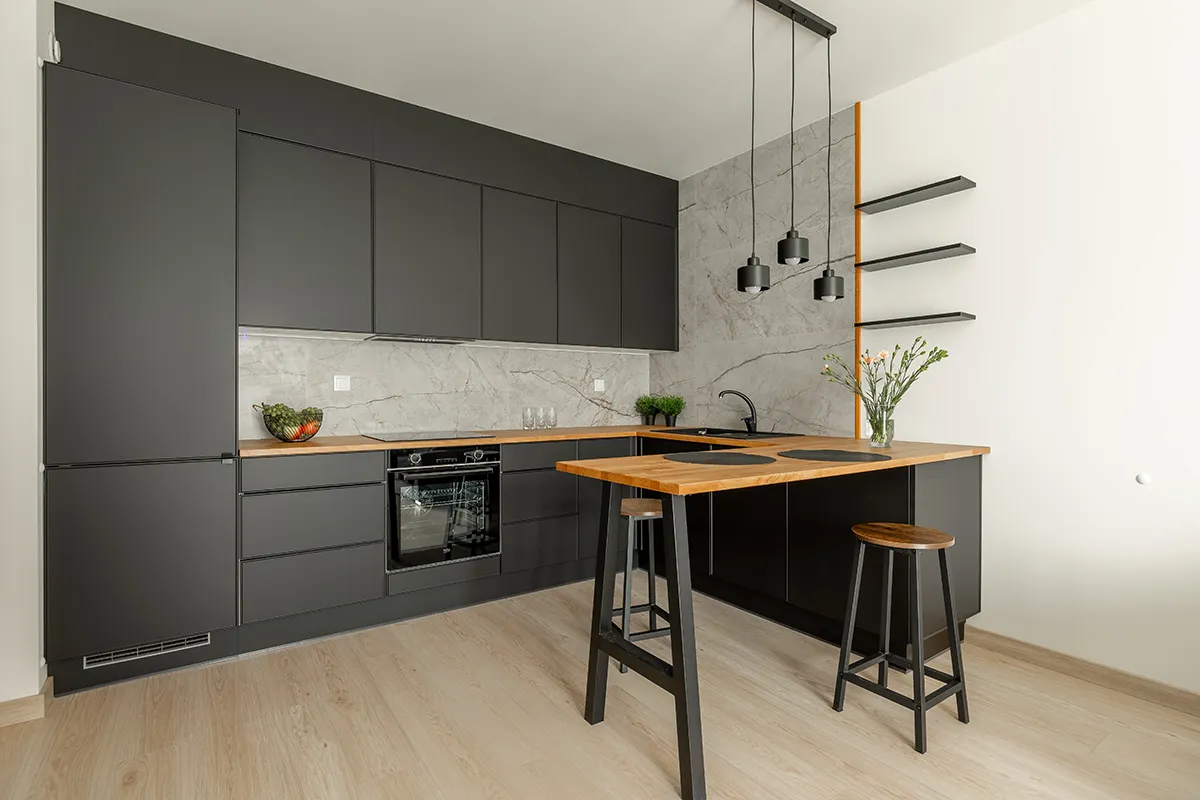 Nowoczesna czarna kuchnia w matowym wykończeniu z wyspą - zdjęcia dla pośredników nieruchomości Łódź